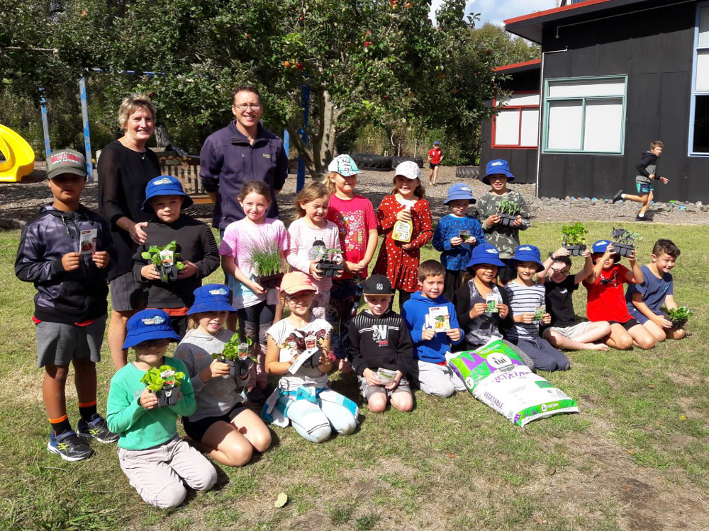 Kaitoke School Vegetable Garden Team with Gareth Carter from Springvale Garden Centre